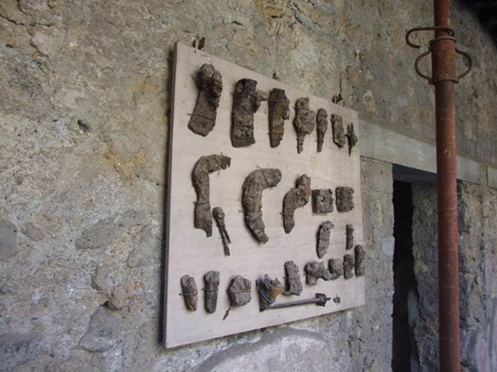 I.10.11 Pompeii.  March 2009.  Room 10.  Peristyle.  Remains of metal tools.