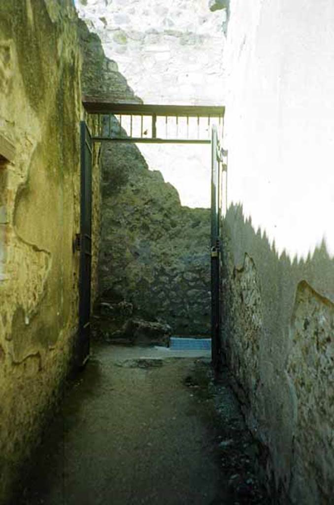 I.10.14 Pompeii. June 2010. Looking west along corridor leading to peristyle of I.10.4. Photo courtesy of Rick Bauer
