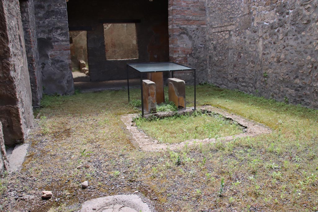 I.11.6 Pompeii. May 2024. Looking south across east side of atrium and impluvium towards tablinum. Photo courtesy of Klaus Heese.