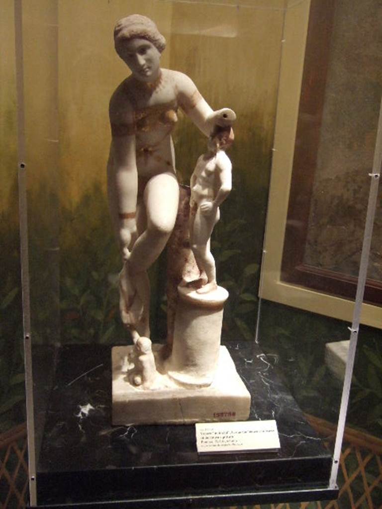 I.11.6 Pompeii. Marble statue of Venus in Bikini. Now in Naples Archaeological Museum. Inventory number 152798.
The museum card shows it as being from II.4.3.
This is an abstract from “I diari di scavo di Pompei” excavation reports which cover the years from 1862 to 1980.  
Our thanks to Raffaele Prisciandaro for this reference.
(relazione del mese di gennaio 1954  sull’attività degli scavi di Pompei)
[…] Il mese di gennaio ha segnato il rinvenimento di oggetti la cui importanza si ripercuote e nella cerchia degli studiosi di arte antica e nella trepidazione della pubblica opinione. Poiché la fama del ritrovamento di una Venere abbigliata in modo unico, quasi in bikini, accende molte discussioni e sorpassa anche i confini della nostra terra. Il ritrovamento fu fatto proprio nel tablino della Casa n. 6 sulla via dell’Abbondanza Reg. II – Ins. I”  
This house has since been renumbered to I.11.6.

