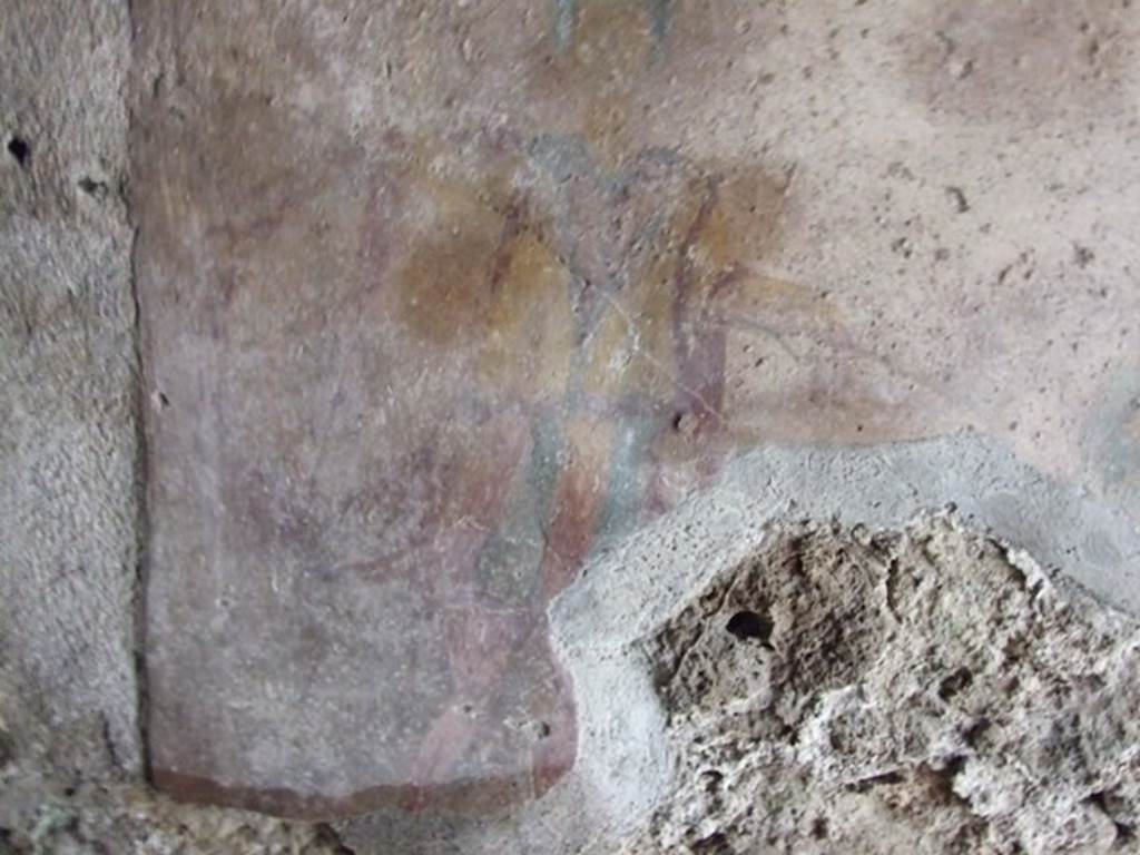 I.11.17 Pompeii. December 2007. Room 6, detail of Lar at (left) north end of lararium painting in kitchen.
See Frhlich, T., 1991, Lararien und Fassadenbilder in den Vesuvstdten. Mainz: von Zabern. (L23 on p.258 and picture 27,3).
