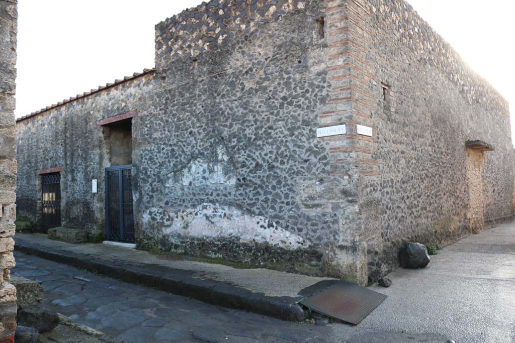 I.15.3 Pompeii, with I.15.2, on left. December 2018. 
Entrance doorways at west end of I.15, at junction with Vicolo della Nave Europa. Photo courtesy of Aude Durand.
