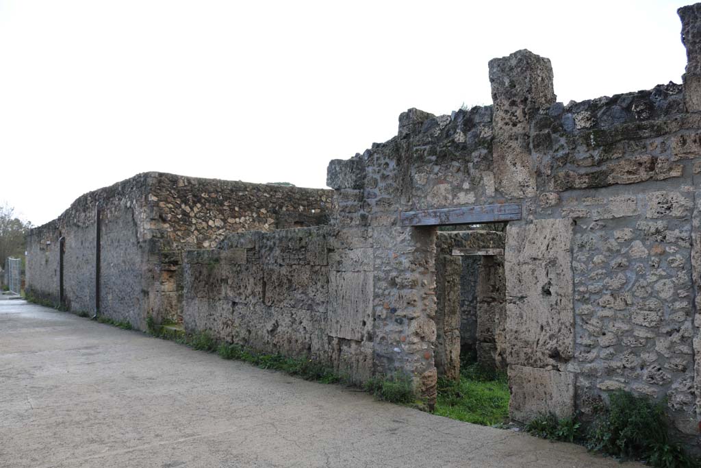 I.16.7 Pompeii, on right. December 2018. 
Looking south-west towards entrance doorway on west side of Vicolo della Nave Europa. Photo courtesy of Aude Durand.



