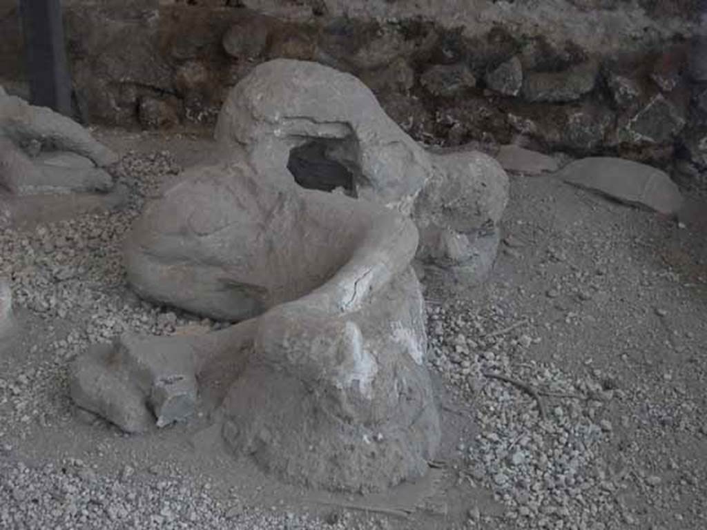 I.21.6 Pompeii. May 2010. Detail of plaster cast of impression of a body.