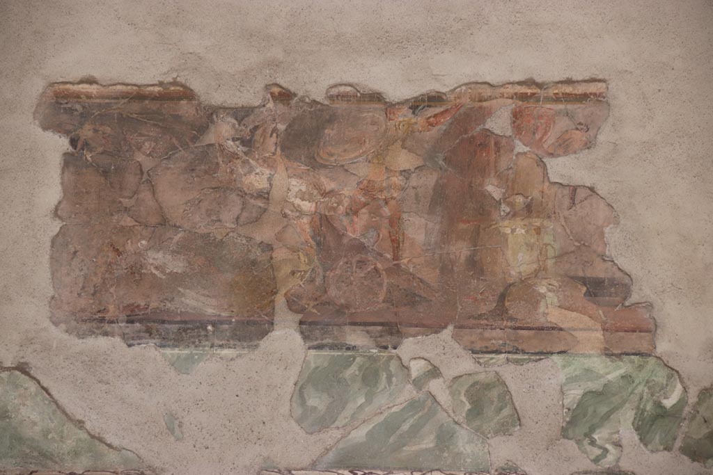 II.2.2 Pompeii. October 2023. Room “h”, north wall. Patroclus fights wearing the armour of Achilles. Photo courtesy of Klaus Heese.

