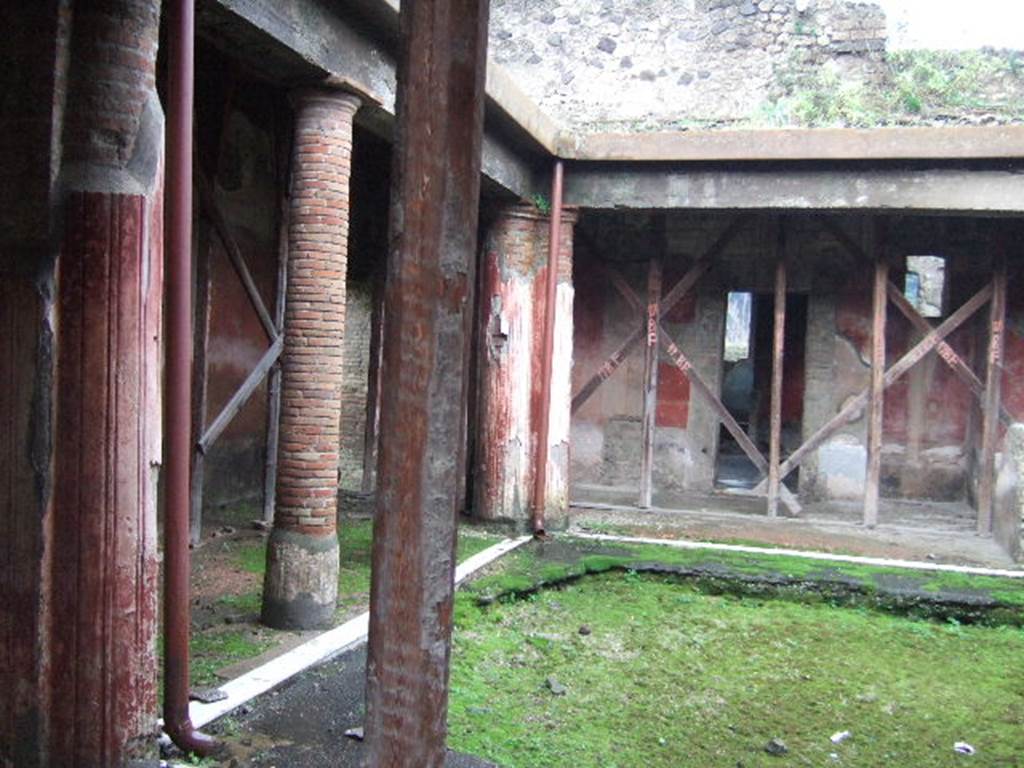 II.4.6 Pompeii. December 2018. 
Looking towards the east side and south-east corner of the portico of the baths, from entrance doorway. Photo courtesy of Aude Durand.
