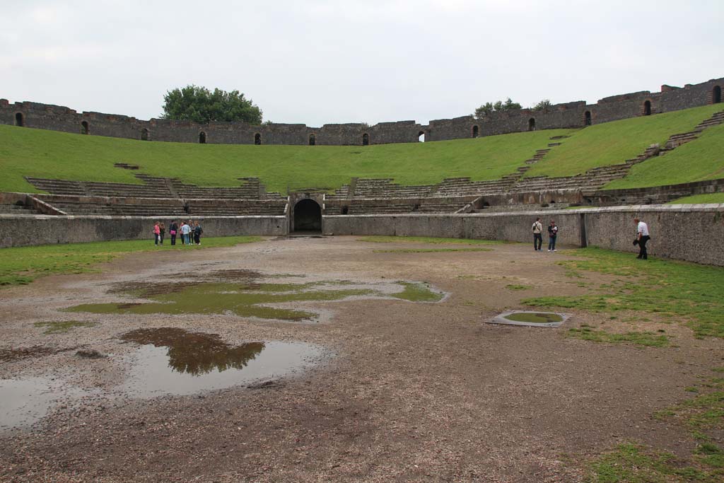 II.6 Pompeii. April 2014. Looking south across arena and seating of amphitheatre. 
Photo courtesy of Klaus Heese.
