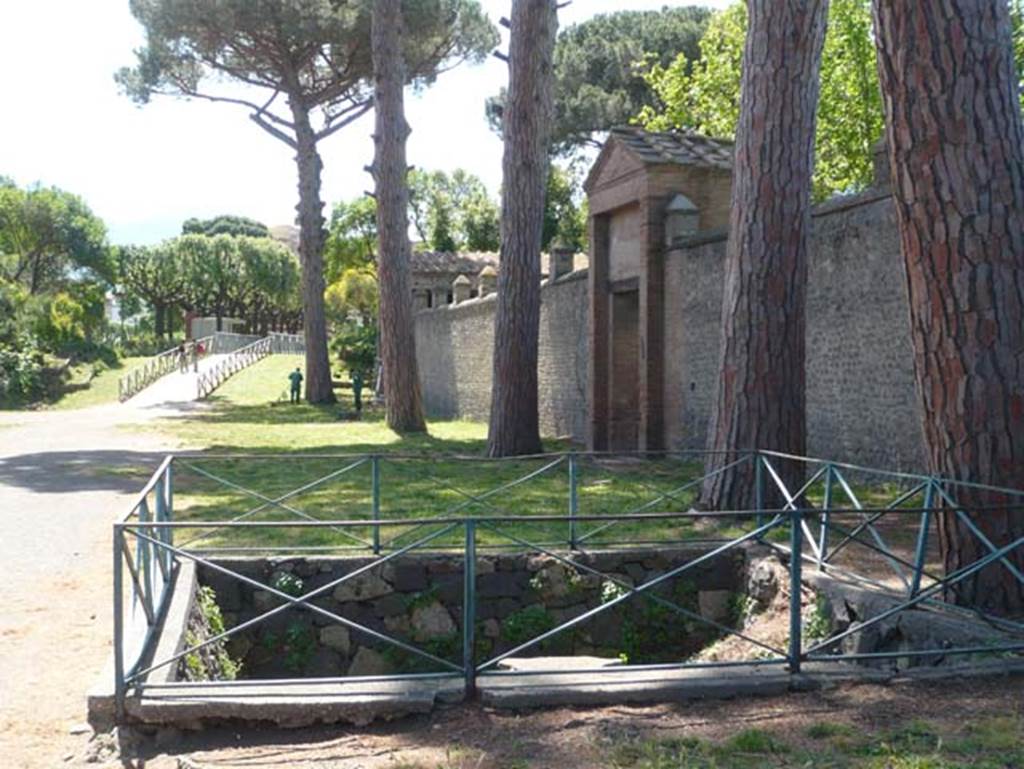 II.7.3 Pompeii. Palaestra. May 2012. Looking south along wall from near II.7.3, with entrance to II.7.2, centre right.  Photo courtesy of Buzz Ferebee.
