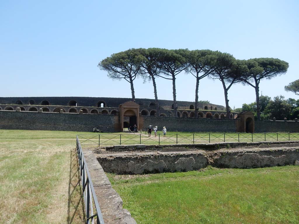 II.7 Pompeii. June 2019. Looking east towards entrance doorway from north-east corner of pool. Photo courtesy of Buzz Ferebee.