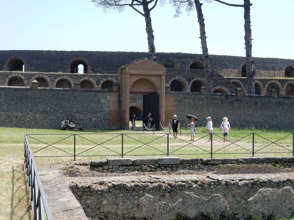 II.7 Pompeii. June 2019. Looking east towards entrance doorway at II.7.3, from south-west corner of pool.
Photo courtesy of Buzz Ferebee.
