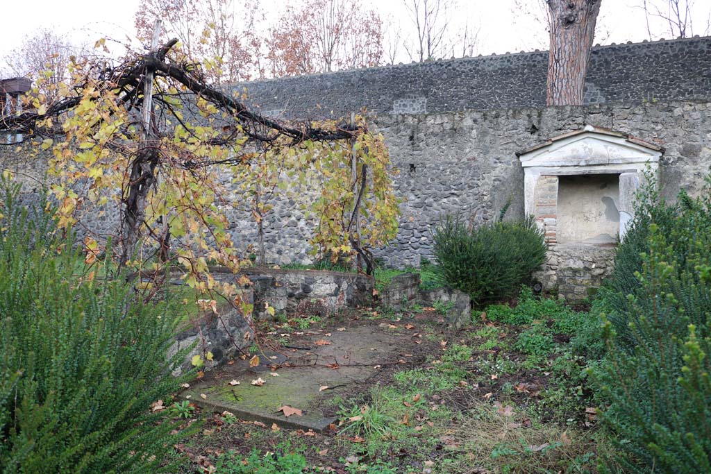 II.8.6 Pompeii. December 2018. Looking north-east towards triclinium and Lararium against east wall. Photo courtesy of Aude Durand.