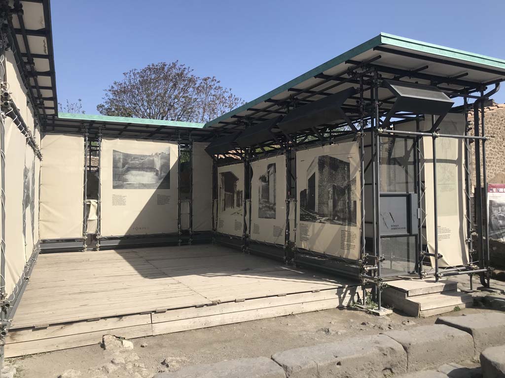 III.3.6 Pompeii. April 2019. Looking north to display exhibition in centre of schola. Photo courtesy of Rick Bauer. 

