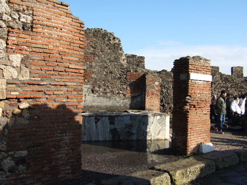 VI.3.19 Pompeii. December 2005. Looking east into bar-room, from entrance at VI.3.19.  