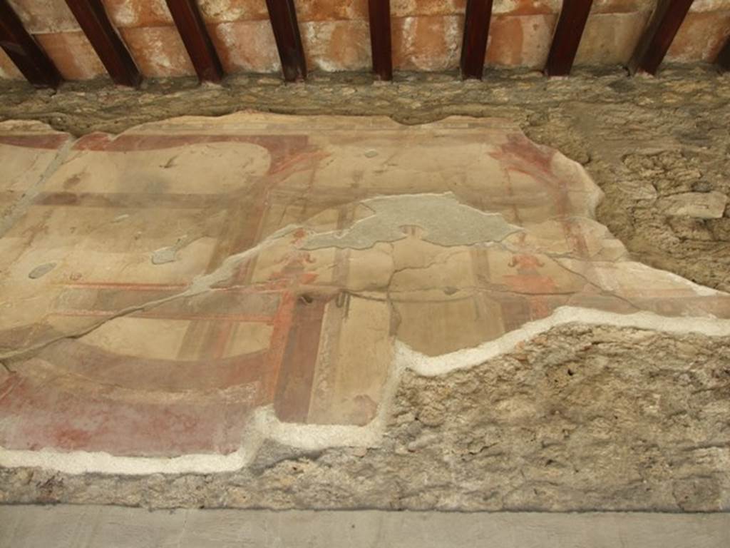 VI.9.6 Pompeii.  March 2009.  Room 6.  Peristyle.  North wall above entrance doorway.