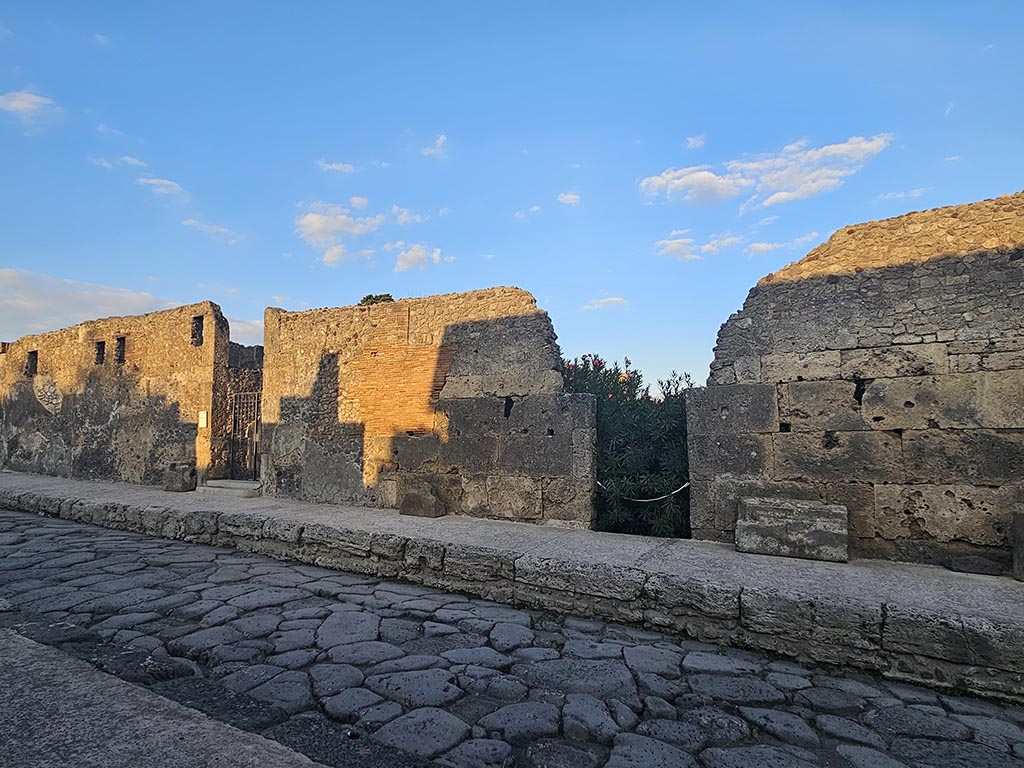 Via di Mercurio, east side, Pompeii. November 2024. 
Looking east towards doorway to VI.10.7 on left, and VI.10.8 on right. Photo courtesy of Annette Haug.
