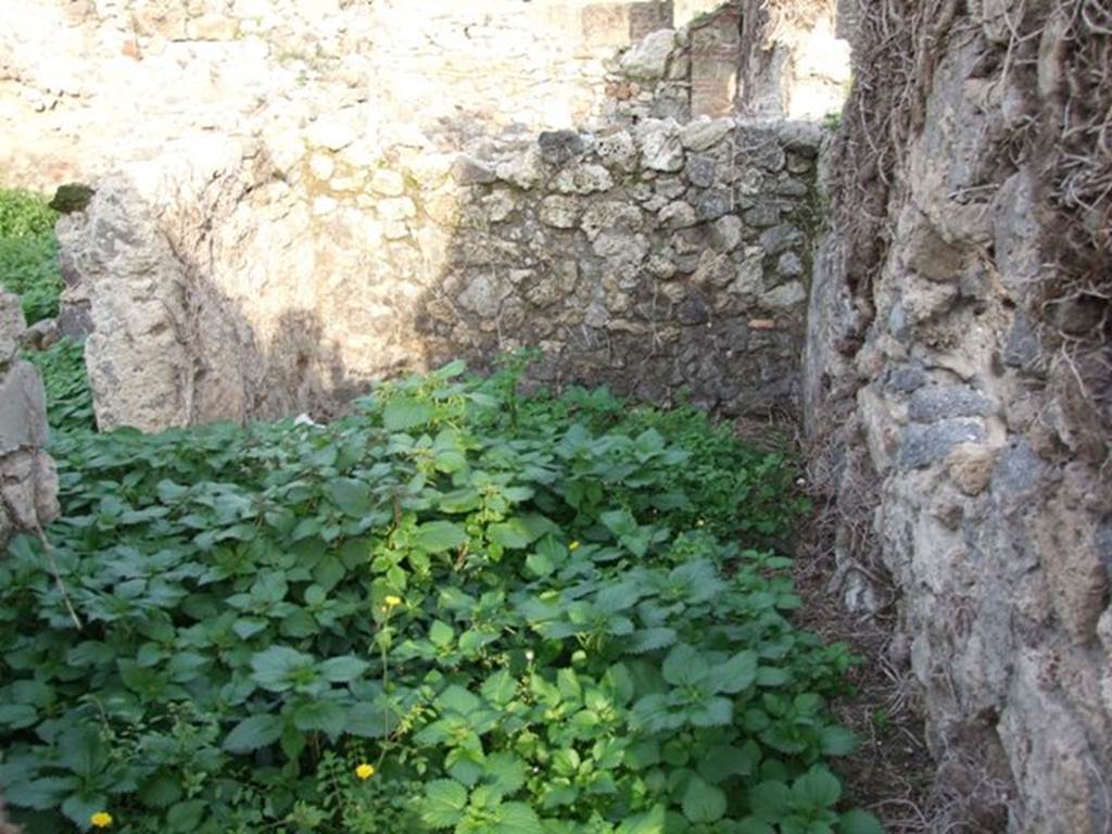 VI.11.1 Pompeii. December 2007. Room under the site of stairs at VI.11.2. Site of steps to upper floor, above a room with a doorway, on left, from front shop-room of VI.11.1.