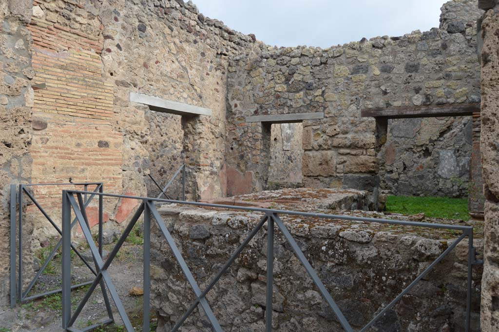 VI.14.36 Pompeii. October 2017. Looking north-east across bar-room counter towards doorway at VI.14.35, centre left.
Foto Taylor Lauritsen, ERC Grant 681269 DÉCOR.
