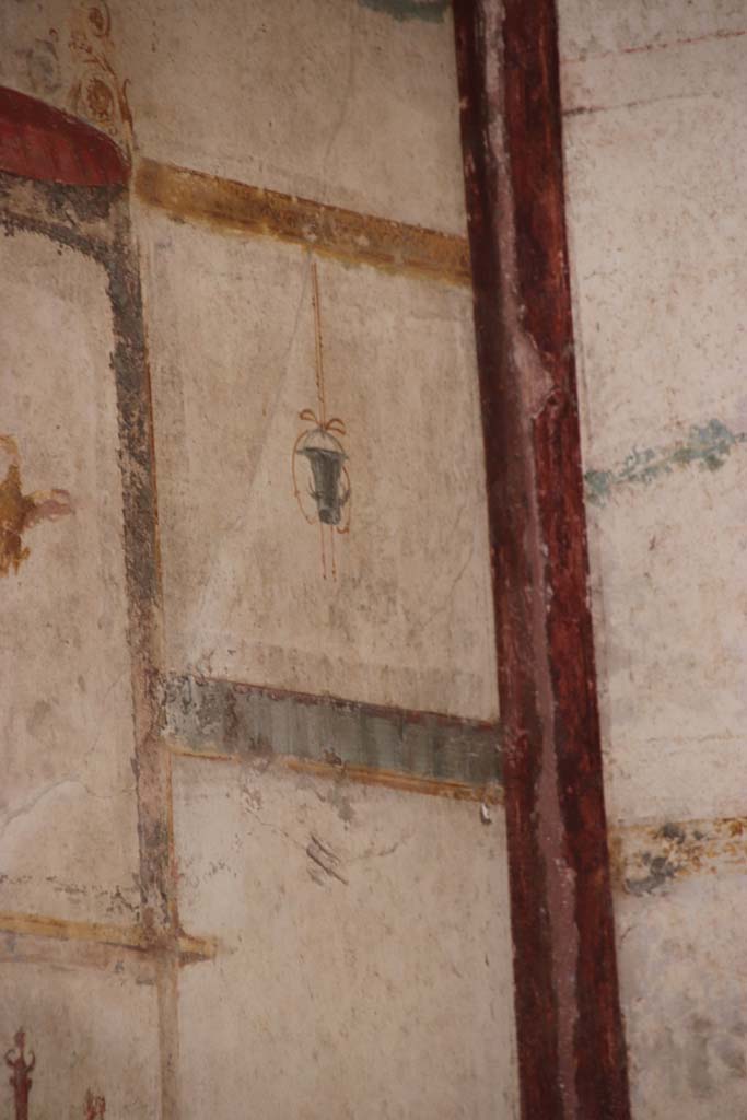 VI.16.7 Pompeii. September 2021. 
Detail of painted decoration from upper south wall in south-west corner. Photo courtesy of Klaus Heese.
