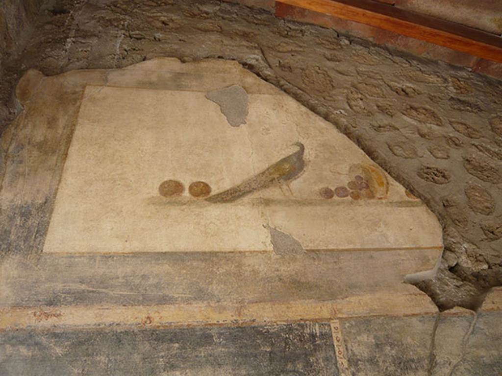 VI.16.7 Pompeii. June 2013. Entrance A upper north wall.
Painting of still life with peacock and fruit, after recent restoration. 
Photo courtesy of Buzz Ferebee.
