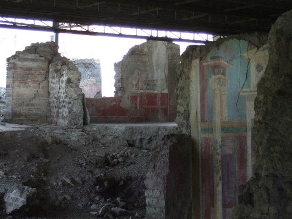 VI.17.36 Pompeii. May 2006. Looking north towards two cubicula of Vi.17.36, on south side of peristyle. Taken from VI.17.41. 
