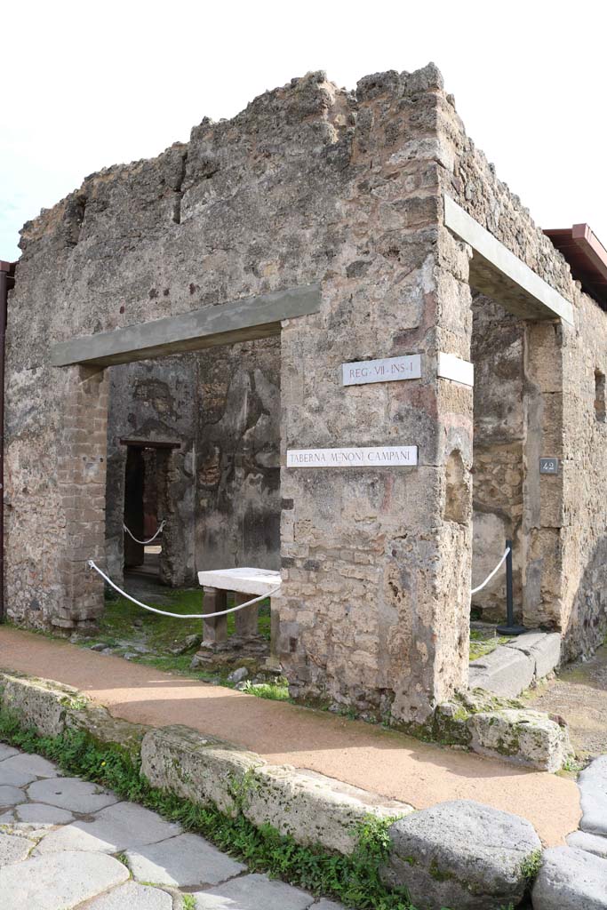 VII.1.41 Pompeii, on left. December 2018. Looking south from Via degli Augustali. 
On the right is the second doorway at VII.1.42, with niche set into pilaster. Photo courtesy of Aude Durand.
