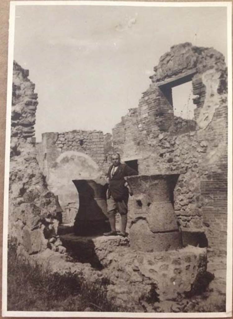 VII.2.22 Pompeii. 1922. Looking north-west across mills towards south wall of oven.
Photo courtesy of Rick Bauer.
