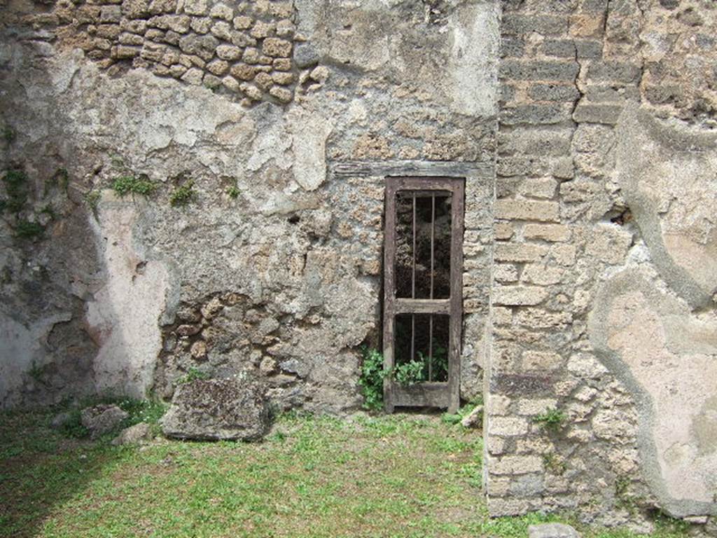 VII.2.41 Pompeii. May 2006. North wall with doorway.