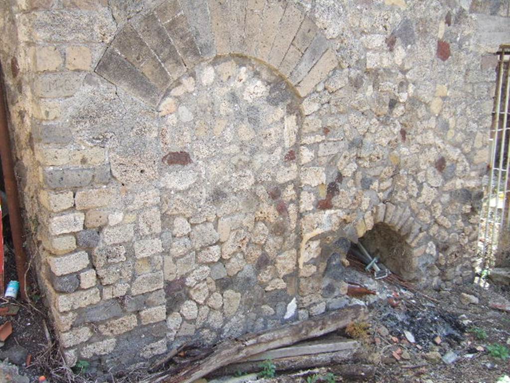 VII.3.28 Pompeii. May 2006 Blocked doorway in east wall, this used to go under stairway through to VII.3.26