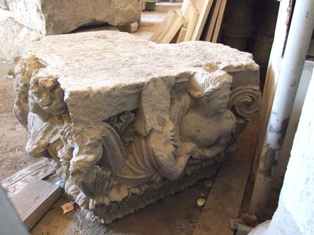 VII.4.57 Pompeii. December 2006, on display in Forum Granaio at VII.7.29. 
Figures of a man and woman on a capital. This faced into the vestibule on the top of left-hand side of entrance.
