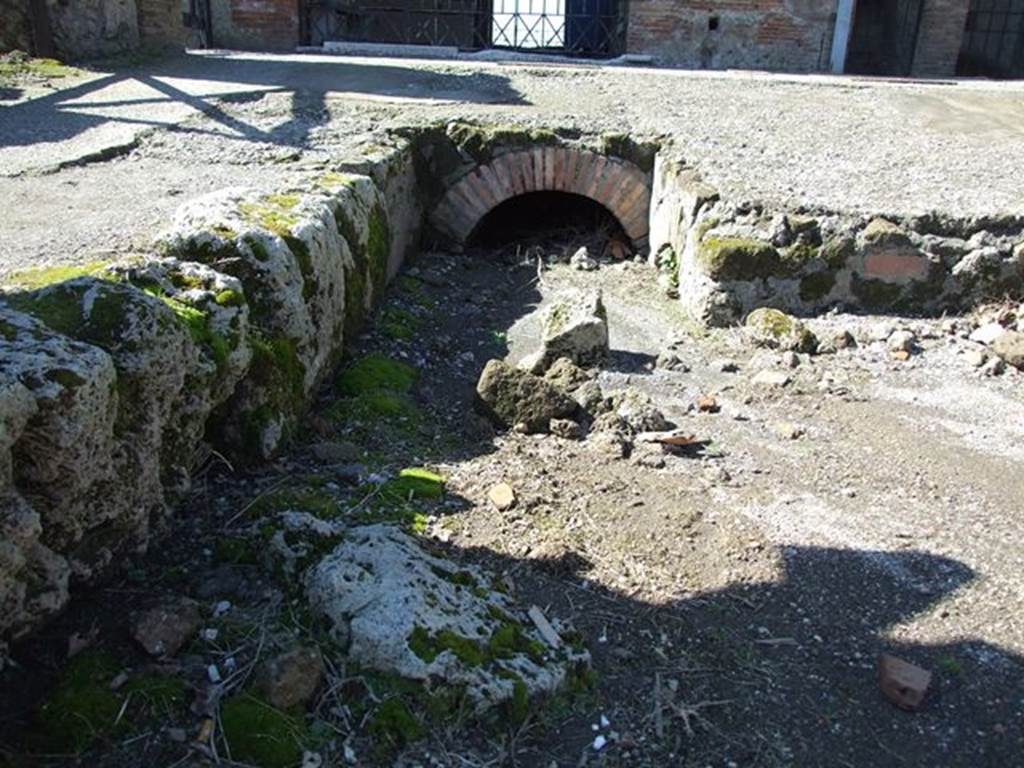 VII.6.1 Pompeii. March 2009.  Road drainage.  South side near VII.6.1.
Looking west to the end of the Via delle Terme, where it joins Vicolo del Farmacista. 

