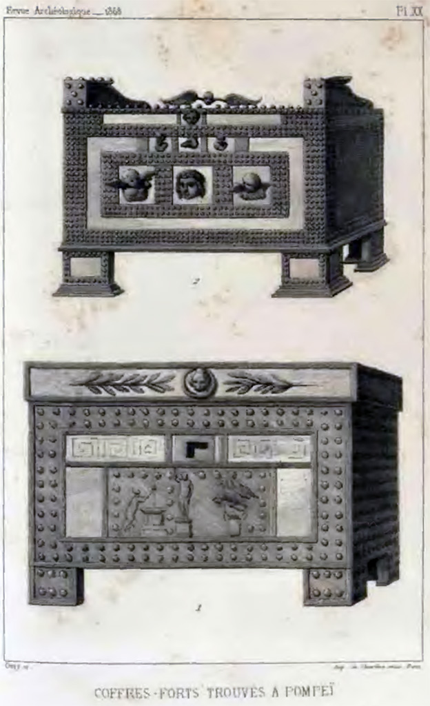 VII.7.5 Pompeii. Drawing of two cash-chests found at Pompeii, and now in Naples Archaeological Museum.
According to de Longpérier –
“The lower cash-chest was found 29th May 1864 in the atrium of a house near the Temple of Venus, facing the Basilica.
The drawing of the top cash-chest was from VII.2.18, and found in the atrium on 22nd May 1867
The lower chest is decorated with a bronze relief representing a sacrifice to Jupiter; behind the figure of the god, we see the eagle holding the thunderbolt in its talons. 
Above, there is a band of meanders. The rim of the lid is fitted with a ring and decorated with a lion's head and garlands. The latter is for opening of the lid. 
The right-angled lock opening shows us that the chest was closed using one of those strong keys whose very thick bit, lightened by complicated openings, presents this same right-angle shape, abandoned quite early.”
See H. de Longpérier, Recherches sur les insignes de la questure et sur les récipients monétaires, RA n.s.18. Paris 1868, 58–72, p. 171, Pl. XX.
See https://archive.org/details/in.gov.ignca.25639/page/n5/mode/2up 


