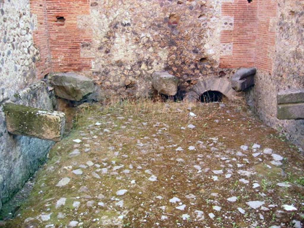 VII.7.28 Pompeii. July 2008. Looking west across latrine. Photo courtesy of Barry Hobson.
The latrine had not yet been completed by the time of the 79AD eruption.
The walls were lacking plaster. The water supply pipes were not connected to the city water supply.
The drainage pipes were not connected to the city sewerage.

