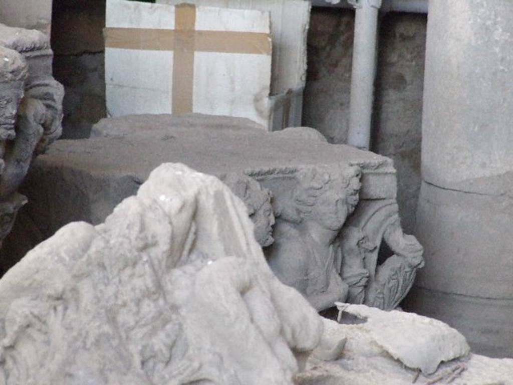 VII.7.29 Pompeii. December 2006. Items in storage. Capital at rear is from doorway of VII.4.57.