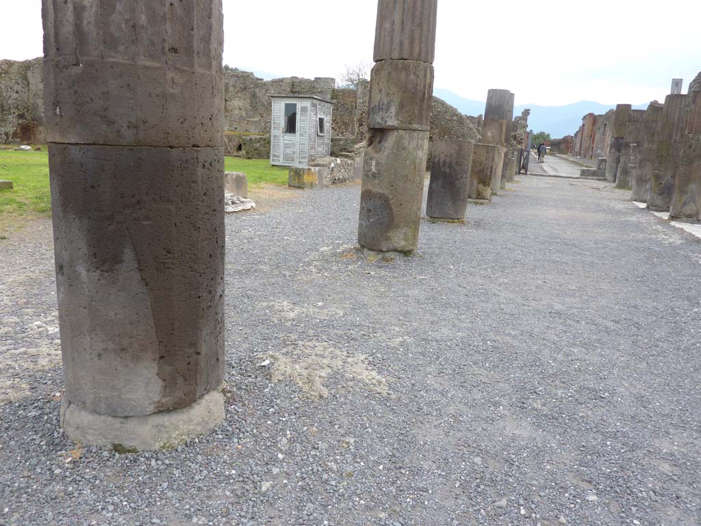 VII.8, Pompeii Forum. March 2014. Looking south-east along portico in south-east corner of Forum, from outside VIII.3.2/3, on left. 
Foto Annette Haug, ERC Grant 681269 DÉCOR.
