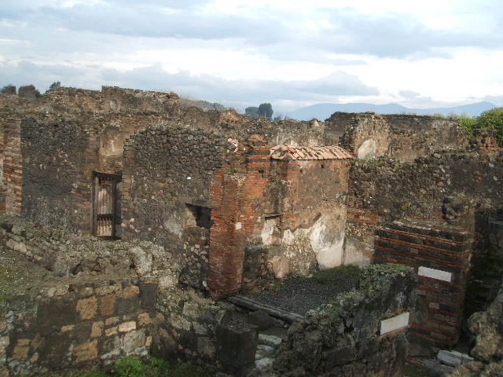 VII.10.3/2/1 Pompeii. December 2004. Looking east from Eumachias building.