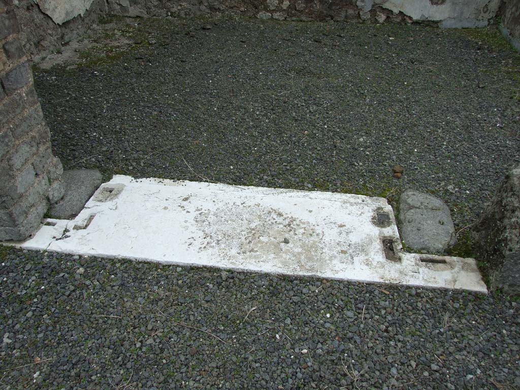 VII.14.5 Pompeii. March 2009. Room 8, door threshold or sill.