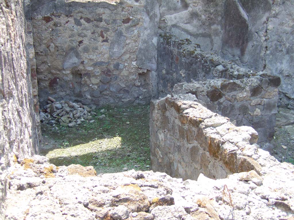 VII.15.4 Pompeii. September 2005. Looking south across two rooms from second doorway on west side of entrance corridor.