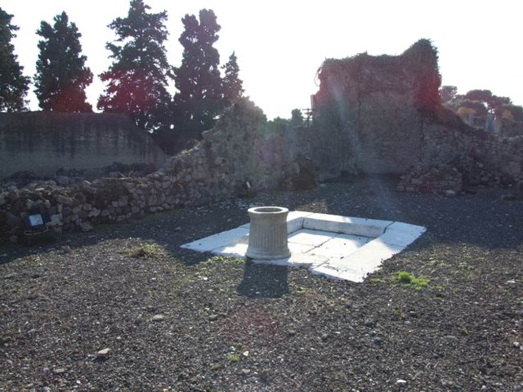 VII.16.10 Pompeii. December 2007. Looking south-west across marble impluvium and puteal in atrium towards tablinum. 
