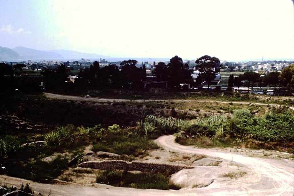 VII.16.22 Pompeii. 1964. Looking south-west towards the Circumvesuviana railway station, and the Sorrentine Peninsula. Photo by Stanley A. Jashemski.
Source: The Wilhelmina and Stanley A. Jashemski archive in the University of Maryland Library, Special Collections (See collection page) and made available under the Creative Commons Attribution-Non Commercial License v.4. See Licence and use details.
J64f2029
