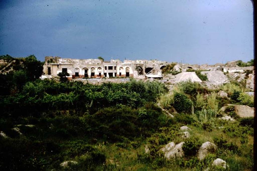 VII.16.22/21/20/19/18/17. Pompeii. 1964. Looking east to rear of complex, still in the process of excavation and consolidation.  Photo by Stanley A. Jashemski.
Source: The Wilhelmina and Stanley A. Jashemski archive in the University of Maryland Library, Special Collections (See collection page) and made available under the Creative Commons Attribution-Non Commercial License v.4. See Licence and use details.
J64f1507
