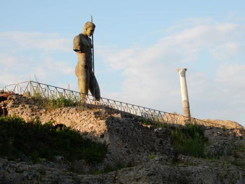 VIII.1.3 Pompeii. May 2016. Looking east along rear of the Temple of Venus.
One of 30 monumental sculptures by Igor Mitoraj located around the area of Pompeii. Photo courtesy of Buzz Ferebee.


