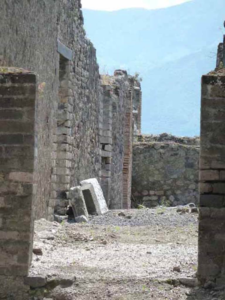 VIII.2.7 Pompeii. May 2010. Rear doorways of VIII.2.13 and 14, on left, looking south.