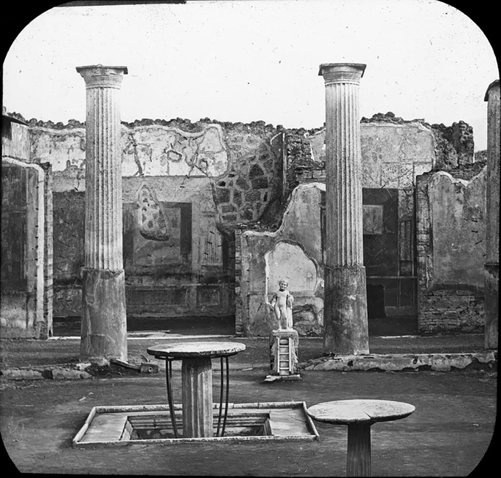 VIII.4.4 Pompeii. Looking south across garden area to rooms overlooking the south portico, with doorway to room 12 on right. 
This photo shows the decoration on the south wall in the room. On the left is the entrance to room 11, the exedra.
Photo by permission of the Institute of Archaeology, University of Oxford. File name instarchbx202im 013 Resource ID. 44495 
See photo on University of Oxford HEIR database
