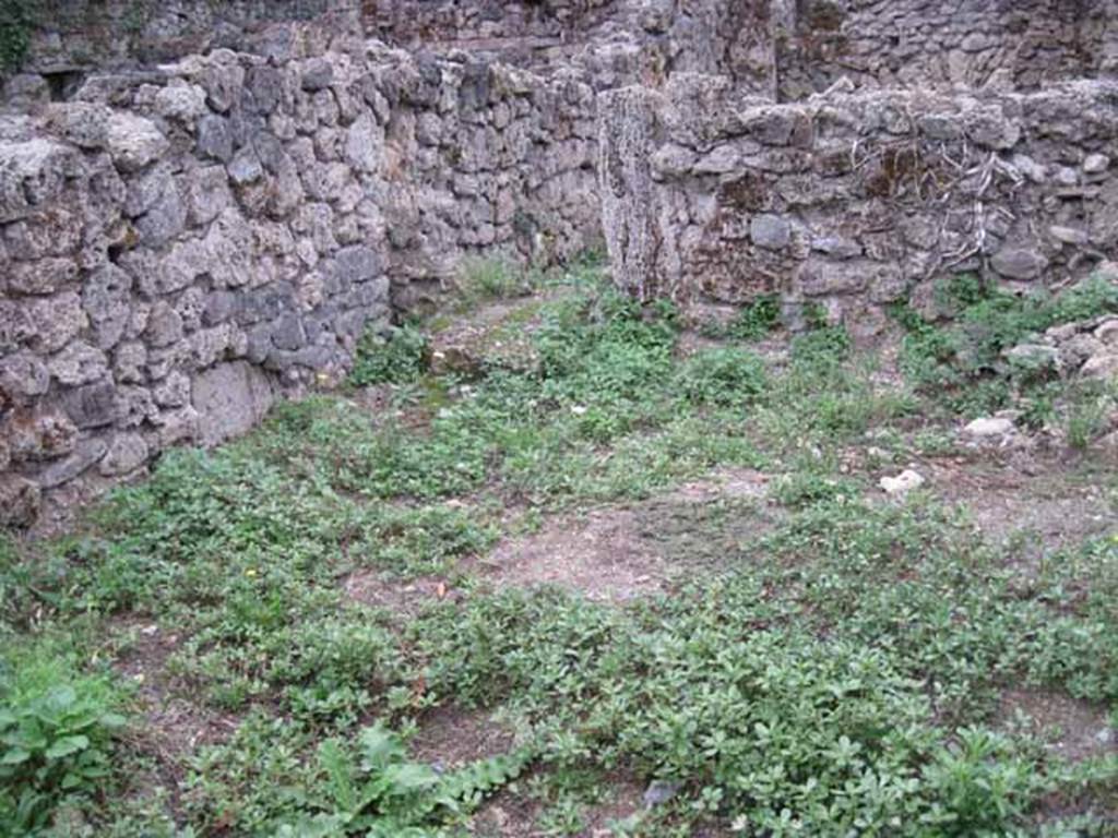 VIII.7.5 Pompeii. September 2010. West wall of rear room, with doorway into the “rustic” room of VIII.7.6. Photo courtesy of Drew Baker.

