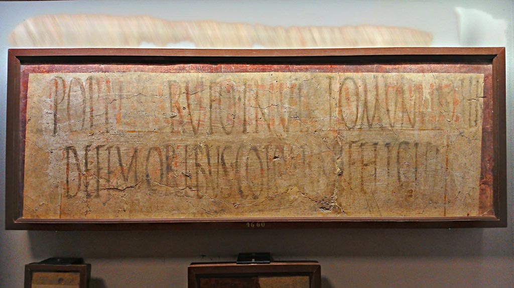 VIII.7.16 Pompeii. Fragment of plaster, painted in black but partly faded.
Now in Naples Archaeological Museum. Inventory number 4660. Photo courtesy of Giuseppe Ciaramella, June 2017.
