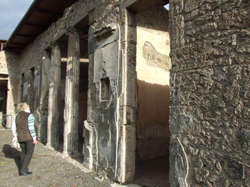IX.1.20 Pompeii.  December 2007.  Room 2.  Atrium.   East side showing doorways to Room 5 (with window) and Room 6 Ala with columns.

