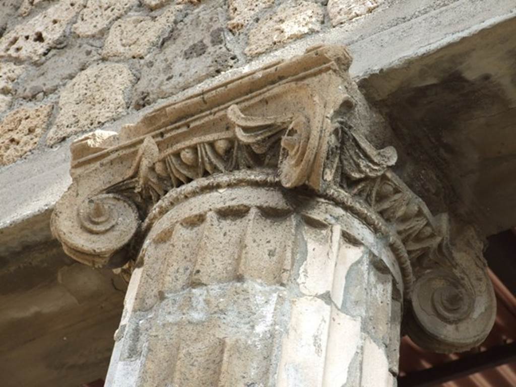 IX.1.20 Pompeii.  December 2007.  Room 2, east side of atrium. Ionic column capital.