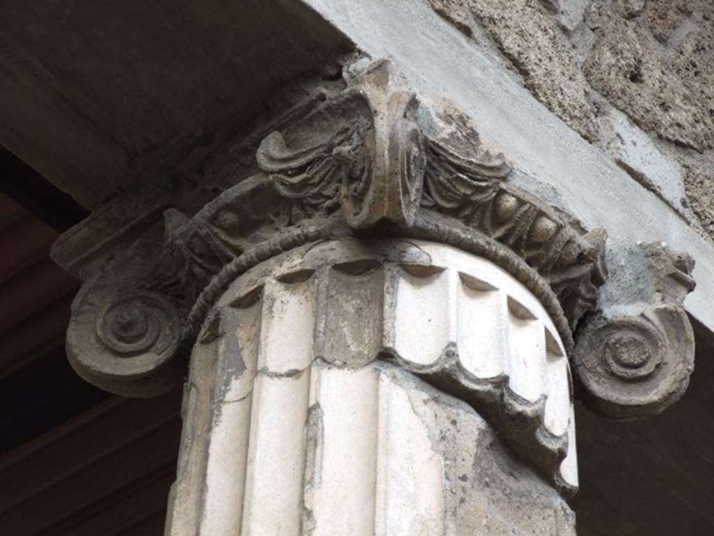 IX.1.20 Pompeii.  December 2007.  Room 2 West Side.  Capital on Ionic column.