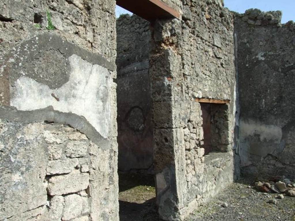 IX.2.18 Pompeii. March 2009. Doorway and window to room 3, triclinium or cubiculum.
According to Fiorelli, and PPM, this room was a triclinium.
See Fiorelli, G: Descrizione di Pompei, 1875, (p.385).
According to PPP, and Eschebach, this room was a cubiculum.
See Bragantini, de Vos, Badoni, 1986. Pitture e Pavimenti di Pompei, Parte 3. Rome: ICCD. (p.419)
See Eschebach, L., 1993. Gebudeverzeichnis und Stadtplan der antiken Stadt Pompeji. Kln: Bhlau. (p.409)
