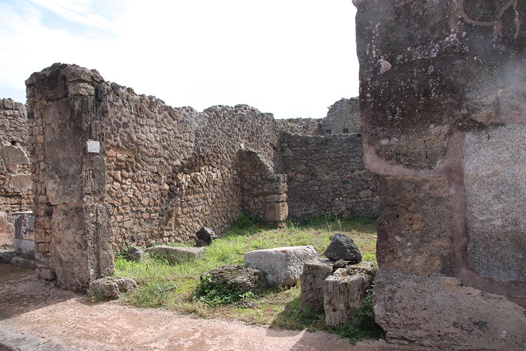IX.7.23 Pompeii. October 2024. 
Looking towards entrance doorway, and east wall and narrow rear room. Photo courtesy of Klaus Heese.
